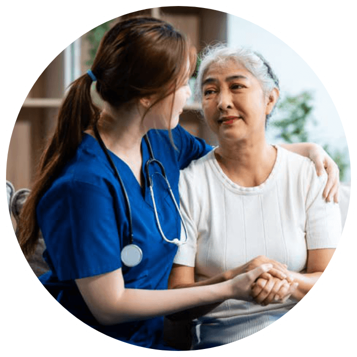 Nurse holding patient's hand